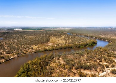 Aerial Landscape View Of Murray River Plains With Turns High Over Woods.