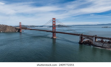 aerial landscape view of San Francisco Bay Area with Golden Gate Bridge in front and Alcatraz Island on right side  - Powered by Shutterstock