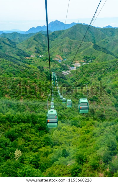 The Aerial Lift Cable Car\
Tramway at the Top of The Great Wall of China in the Jinshanling\
Mountains
