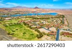 Aerial of Luxury Golf Course and Homes in Desert Oasis Setting