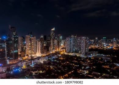 Aerial Of Makati CBD And Bel-Air Village At Late Night. Major City In Metropolitan Manila.