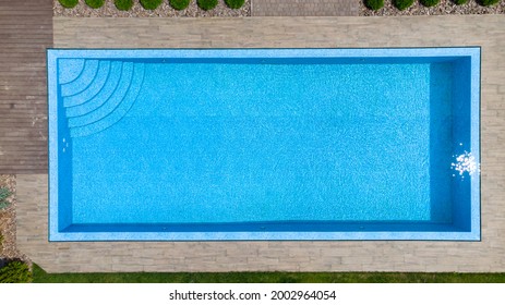 Aerial. Modern Luxury Pool With Staircase. Top View From Drone.