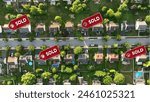 Aerial of a neighborhood with sold signs over several houses. Top down shot above modern American housing development with hot real estate market. 3D render