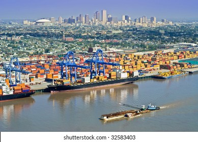 Aerial Of New Orleans Port Activity With Cityscape