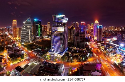 Aerial night skyline of Downtown Taichung, the vibrant metropolis in central Taiwan, with modern skyscrapers booming in the 7th Redevelopment Zone and colorful city lights dazzling in the dark