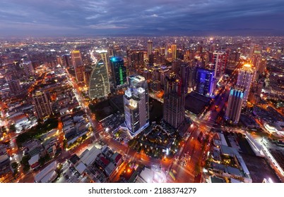 Aerial night skyline of Downtown Taichung, the vibrant metropolis in central Taiwan, with modern high-rise office buildings booming in the 7th Redevelopment Zone and city lights dazzling at blue dusk