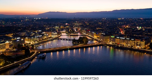 Aerial  night view of Geneva city waterfront skyline in Switzerland
