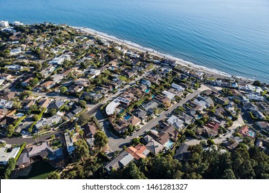 Aerial of ocean view homes between Santa Monica and Malibu in the Pacific Palisades neighborhood of Los Angeles, California.   - Shutterstock ID 1461281327