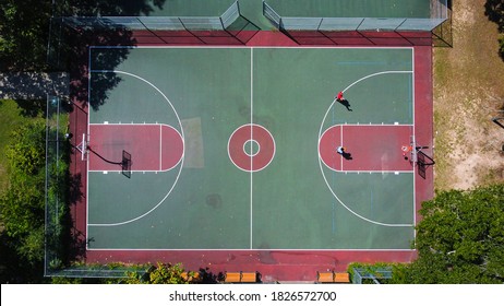 Aerial Outdoor Basketball Court With Players Overhead Shot Top Down View, Daytime Photo, Conroe Texas Park, Conroe Texas, Conroe Skatepark - Powered by Shutterstock