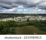 Aerial over the Martindale area of St. Catharines, Ontario, Canada on a summer morning with mixed clouds and sunshine in September, 2024.