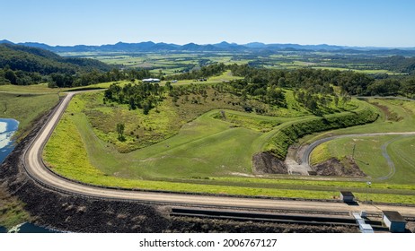 Aerial Over Rock Wall Of Teemburra Dam Queensland Australia Toward Agricultural Landscape