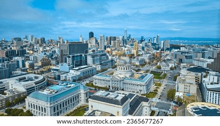 Aerial over San Francisco with view of government buildings and distant bay
