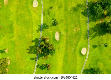 Aerial Overhead Photo Of A Golf Course Vibrant Green Grass Scene