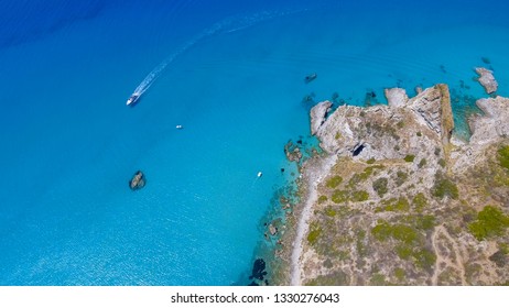 Aerial Overhead View Of Boat Speeding Up In The Ocean, Freedom Concept.