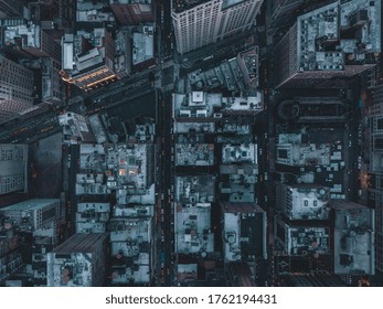 Aerial Overhead View Of Manhattan, New York City Streets Right After Dusk With Street Lights