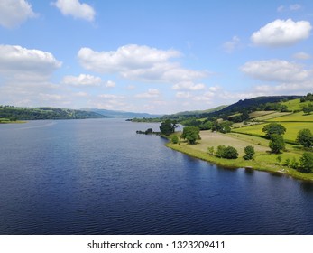 Aerial Pan Shot Of Train On Bala Lake Railway, Snowdonia, Wales, UK