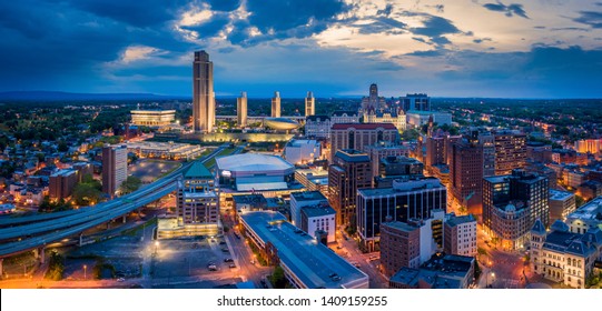 Aerial panorama of Albany, New York downtown at dusk. Albany is the capital city of the U.S. state of New York and the county seat of Albany County