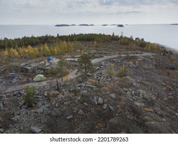 Aerial Panorama Of A Campsite In A Scenic Nordic Location. In The Background You Can See The Archipelago Of Islands In The Sea. Theme Of Active Rest.