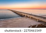 Aerial panorama of Chesapeake Bay Bridge Tunnel at sunset. CBBT is a 17.6-mile bridge tunnel that crosses the mouth of the Chesapeake Bay.