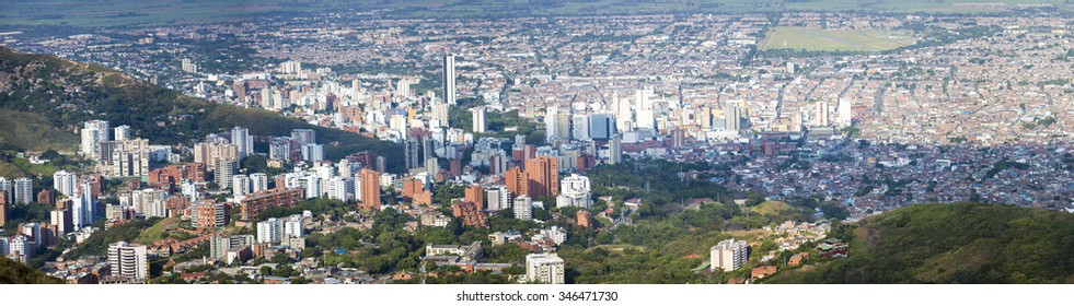 Aerial panorama of the city of Cali taken from the top of Cristo del Rey against a blue sky. Colombia 2015