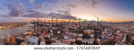 Aerial panorama drone shot of Fisherman's Bastion on Buda Hill in Budapest sunset time