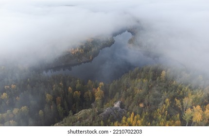 Aerial Panorama Of A Forest Lake Shrouded In Mist. Autumn Entourage