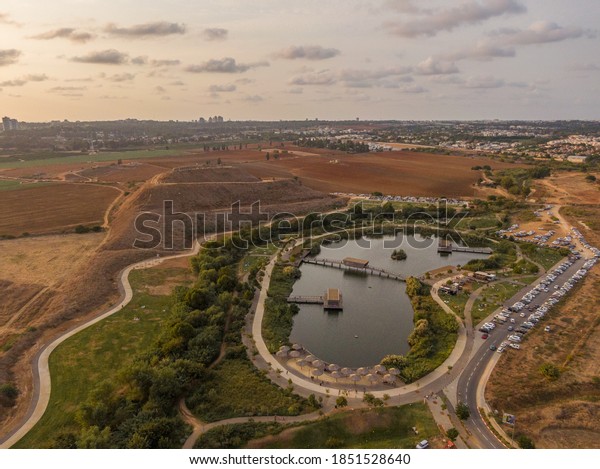Aerial\
panorama of the Hod Hasharon Lake Park,\
Israel