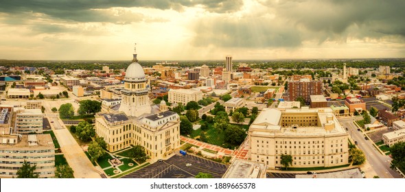 Aerial Panorama Of The Illinois State Capitol And Springfield Skyline Under A Dramatic Sunset. Springfield Is The Capital Of The U.S. State Of Illinois And The County Seat Of Sangamon County