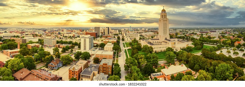 Aerial panorama of Lincoln, Nebraska under a dramatic sunset. Lincoln is the capital city of the U.S. state of Nebraska and the county seat of Lancaster County