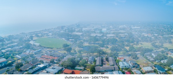 Aerial Panorama Of Melbourne Suburbs Covered In Smoke Haze From Bush Fires In Gippsland