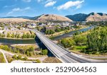 Aerial panorama of Missoula, Montana, above Beartracks Bridge. Missoula is a city in and the county seat of Missoula County, Montana. It is located along the Clark Fork River.