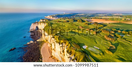 Aerial panorama of seaside with chalk cliffs at Etretat - Normandy, France