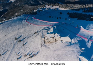 Aerial Panorama Of Ski Slope Of Krvavec In Slovenia, Visible Also A Ski Race Course Between The Red Fence.