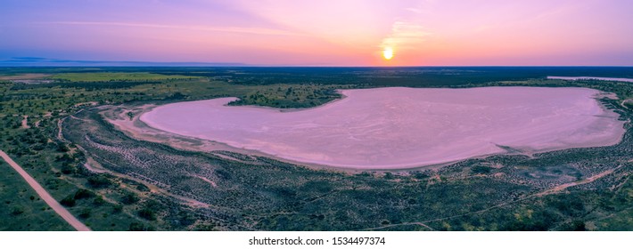 Aerial Panorama Of Sunset Over Pink Lake In Australia