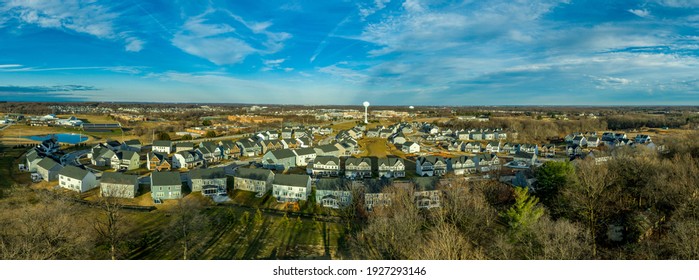 Aerial Panorama View Of American Upper Middle Class Luxury Living, New Neighborhood With Curving Streets Lined With Multi Story Single Family Homes, Sun Rooms, Decks Easy Access To The Job Market