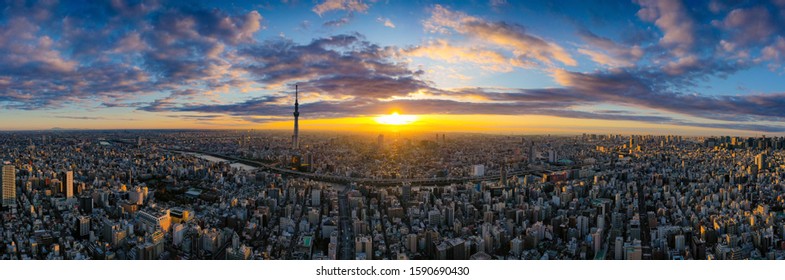 Aerial panorama view by drone of Tokyo Cityscape with Tokyo Sky Tree visible in Tokyo city, Japan on sunrise.
