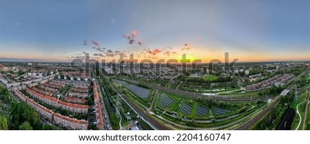Aerial panorama with view of the skyline in The Hague, Netherlands, at sunset above the town of Voorburg