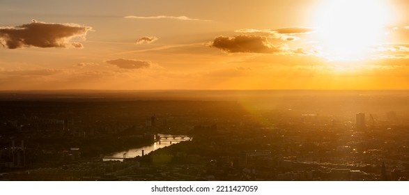 Aerial Panorama view at sunset of central London skyline city skyscrapers river Thames a travel and tourism destination sun flare - Powered by Shutterstock