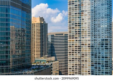 Aerial Panoramic City View Of Chicago Downtown Area At Day Time, Illinois, USA. Bird's Eye View Of Skyscrapers Facades At Financial District, Skyline. A Vibrant Business Neighborhood.