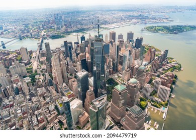 Aerial Panoramic City View Of Lower Manhattan District Towards Downtown, New York City, USA. Bird's Eye View From Helicopter Of Metropolis Cityscape. A Vibrant Business Neighborhood