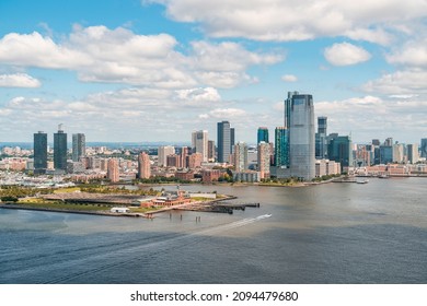 Aerial panoramic city view of New Jersey City financial Downtown skyscrapers. Bird's eye view from helicopter. Jersey city is an important transportation center for the Port of New York and New Jersey
