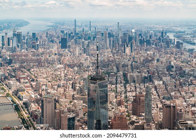 Aerial Panoramic City View Of Upper Manhattan District With The Top Of The World Trade Center, New York, USA. Bird's Eye View From Helicopter Of Metropolis Cityscape. A Vibrant Business Neighborhood