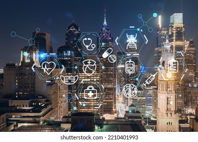 Aerial Panoramic Cityscape Of Philadelphia Financial Downtown At Night Time, Pennsylvania, USA. Hologram Healthcare Digital Medicine Icons. The Concept Of Treatment From Disease, Threat Of Pandemic