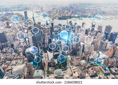 Aerial panoramic helicopter city view, Lower Manhattan, Downtown, New York, USA. World Trade Center, bridges. Decentralized economy. Blockchain, cryptography and cryptocurrency concept, hologram