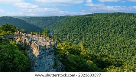 Aerial panoramic image of the Cheat River gorge and the Coopers Rock overlook and viewing platform in summer