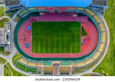 Aerial Panoramic View From Above On Empty Stadium Or Sports Complex, View On Soccer Field Stadium From Bird Eye View