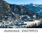 Aerial panoramic view of Champex-Lac on a snowy winter day in Orsieres in the district of Entremont in the canton of Valais in Switzerland