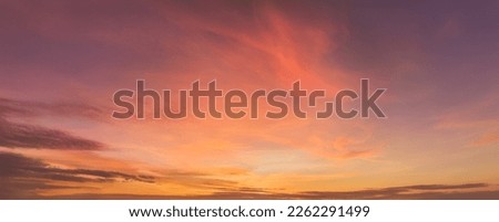 
Aerial, panoramic view  of colorful, pink and red colored evening sky without obstacles in the front. Ideal for sky replacement projects. 