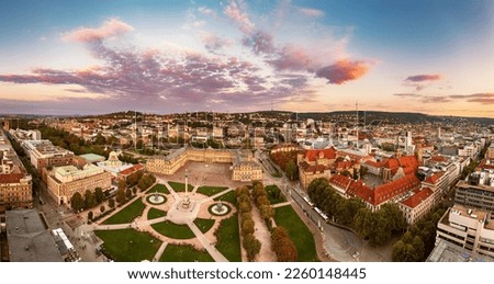 Aerial panoramic view of the famous Schlossplatz in Downtown Stuttgart, Germany at sunset, travel background