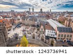 Aerial panoramic view of the historic city of Ghent with famous medieval Gravensteen Castle on a beautiful sunny day with blue sky and clouds in summer, province of East Flanders, Belgium